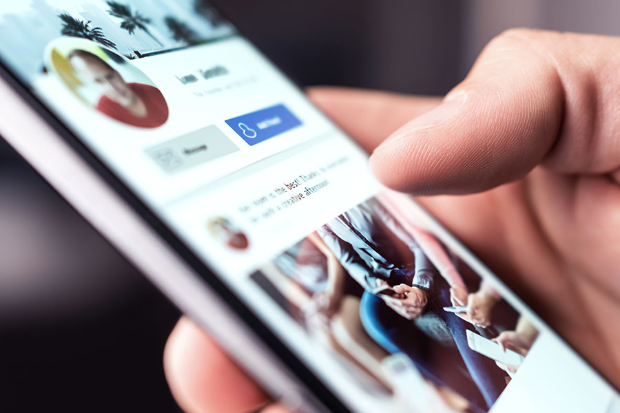 Patient viewing Facebook ads on smartphone