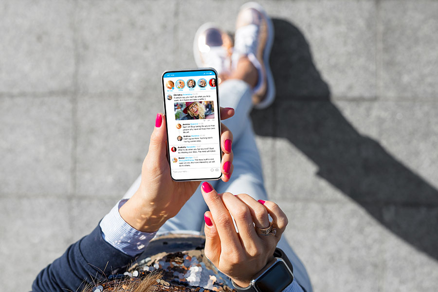 Woman scanning social media posts on Facebook